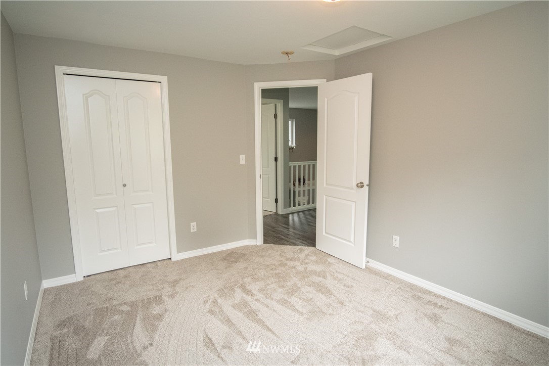 7215 South Rustic Road Seattle, WA 98178 - Photo 28 of 32 a view of a big room with closet and bathroom