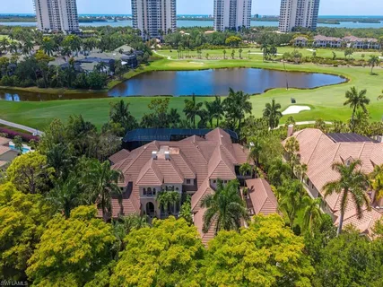 an aerial view of house with swimming pool and outdoor space