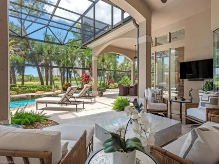a patio with a yard table and chairs