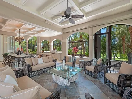 a view of a swimming pool with a patio