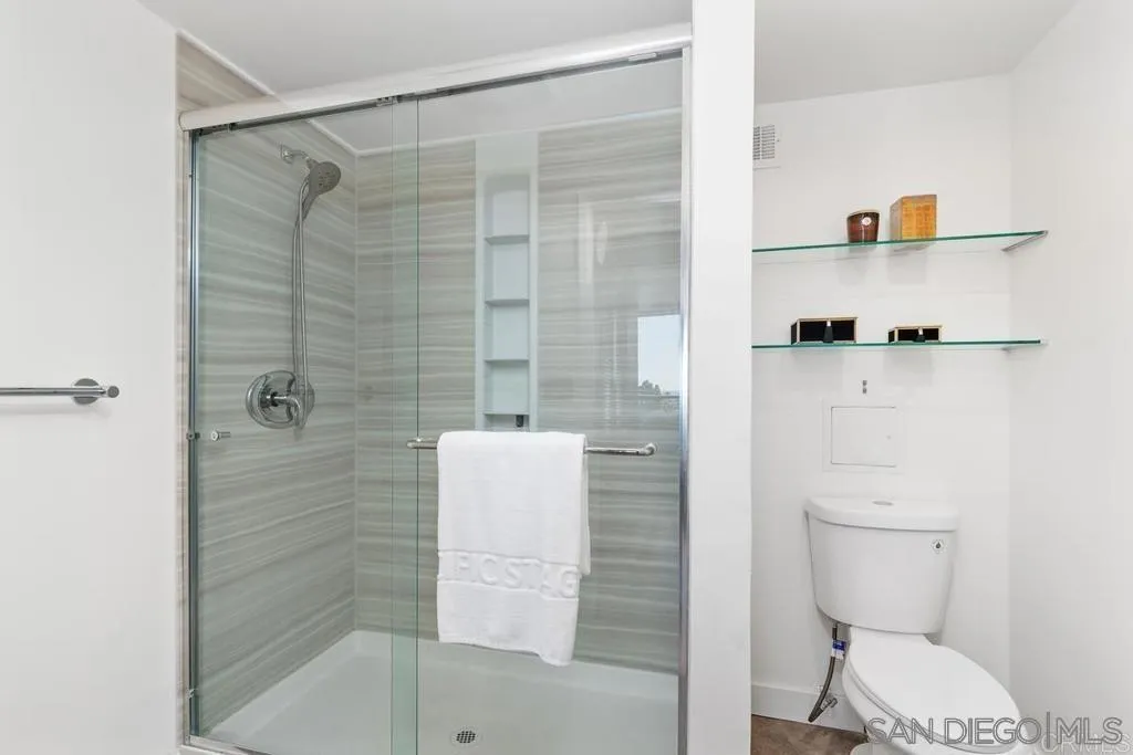 2500 Torrey Pines Road, Unit 402 La Jolla, CA 92037 - Photo 4 of 21 a bathroom with a shower and toilet