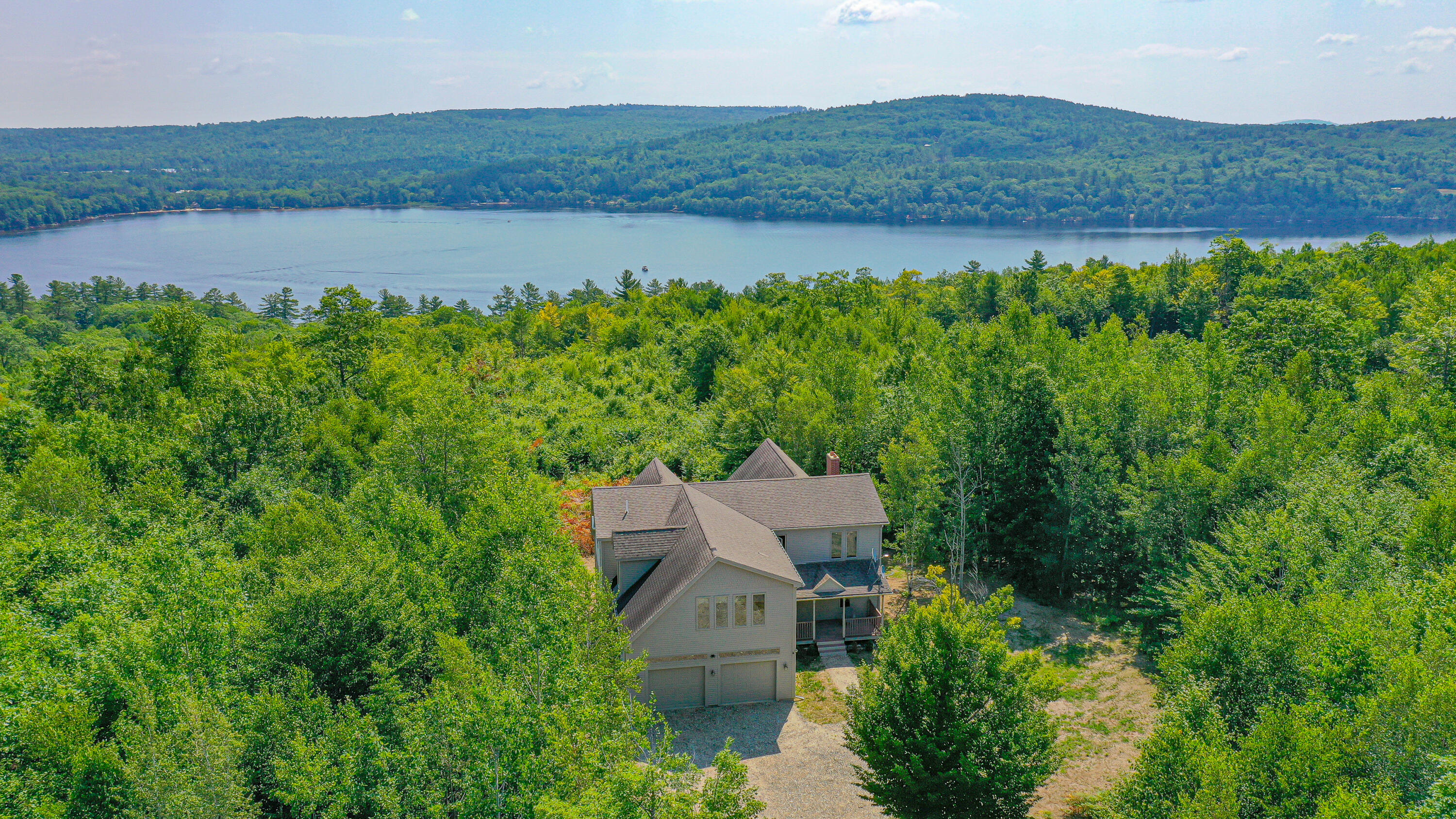 151 Ridgeview Road Harrison, ME 04040 - Photo 2 of 38 front from droner higher 2