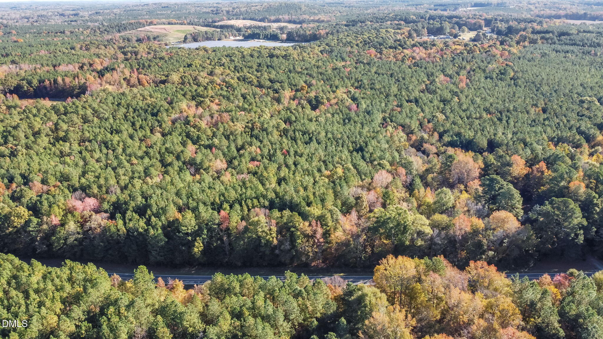 0 Cornwall Road Oxford, NC 27565 - Photo 11 of 16 a view of a lake with a building in the background