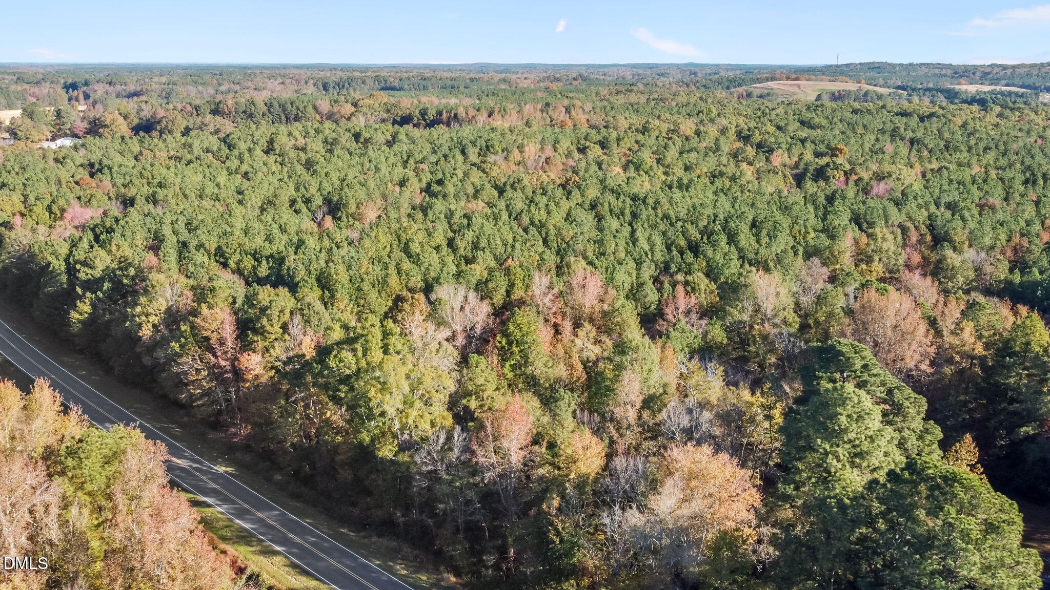 0 Cornwall Road Oxford, NC 27565 - Photo 2 of 16 a view of a city with lush green forest