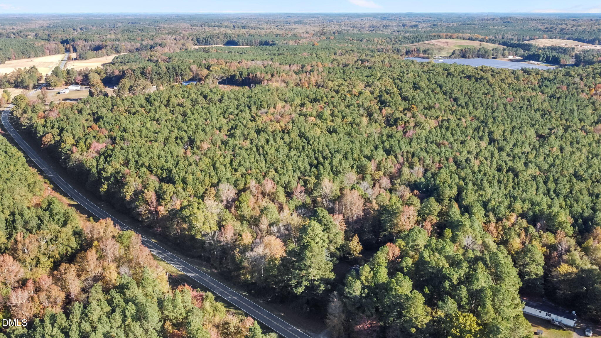 0 Cornwall Road Oxford, NC 27565 - Photo 9 of 16 an aerial view of residential houses with outdoor space and trees