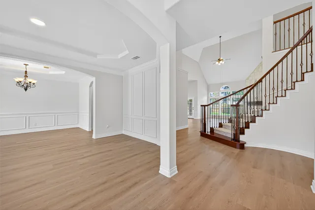 a view of entryway with wooden floor