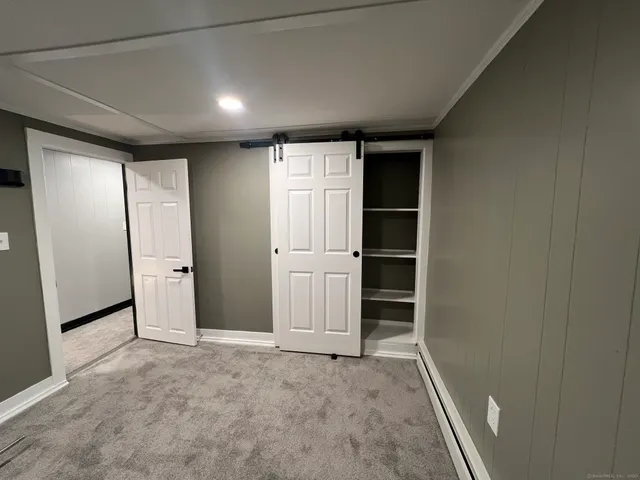 a view of front door with hallway