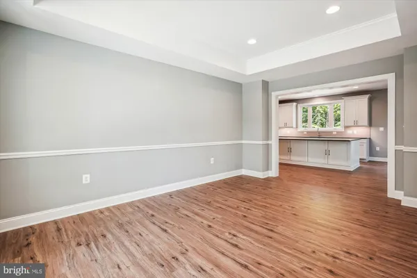 an empty room with a empty space and window
