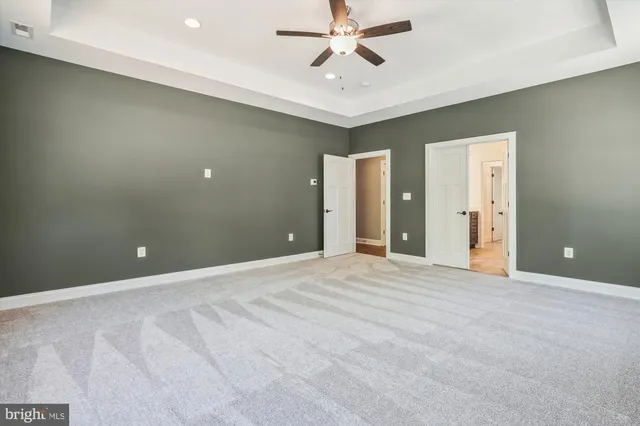 a bathroom with a double vanity sink and mirror