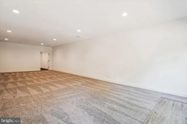 an empty room with a natural light