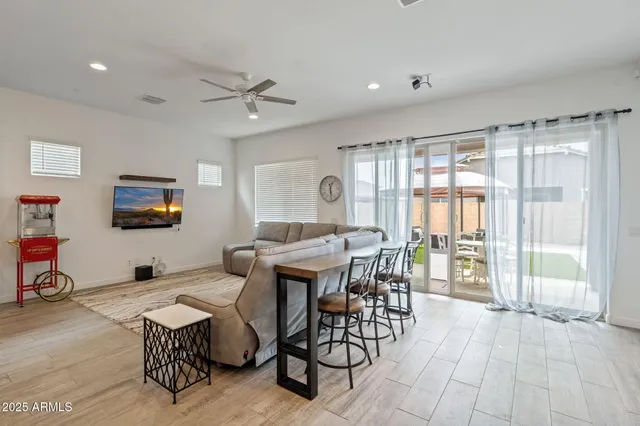 a view of a dining room with furniture window and outside view