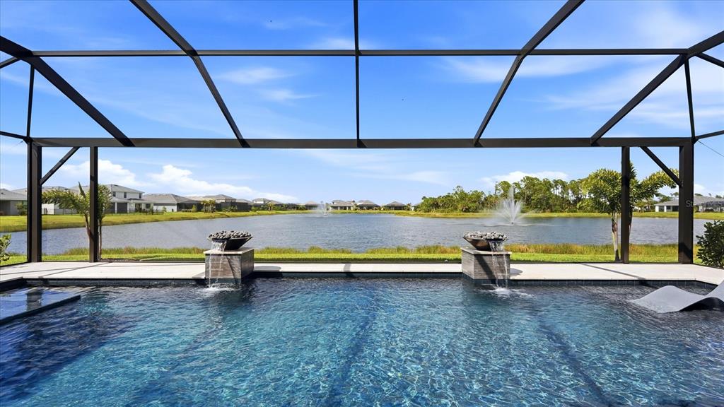 12866 Pinnacle Lane Venice, FL 34293 - Photo 15 of 96 a view of outdoor space with a swimming pool