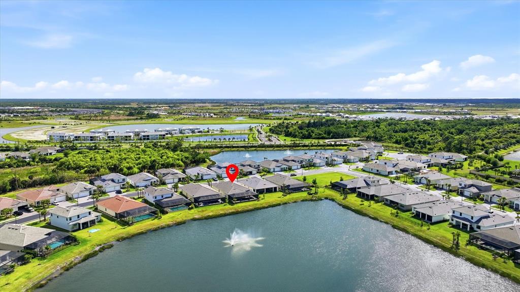 12866 Pinnacle Lane Venice, FL 34293 - Photo 18 of 96 a view of swimming pool and lake view