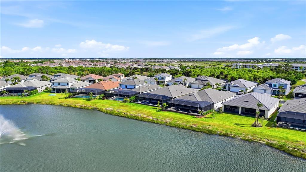 12866 Pinnacle Lane Venice, FL 34293 - Photo 19 of 96 a view of swimming pool with outdoor seating and yard