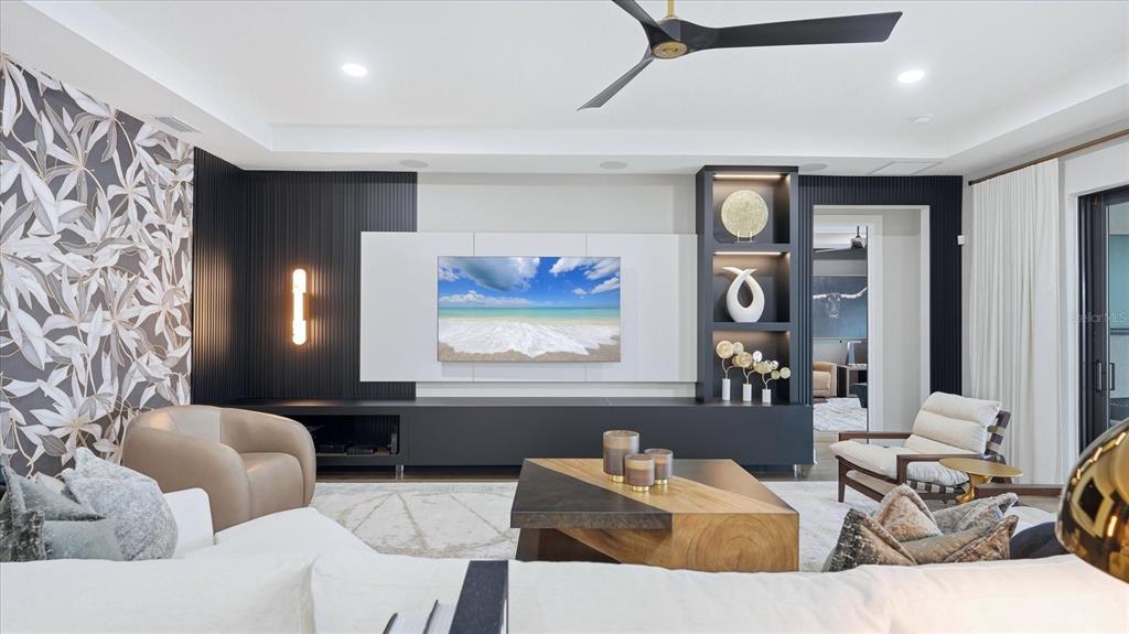 12866 Pinnacle Lane Venice, FL 34293 - Photo 33 of 96 a living room with furniture and window