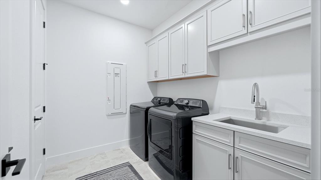 12866 Pinnacle Lane Venice, FL 34293 - Photo 49 of 96 a view of a kitchen with sink