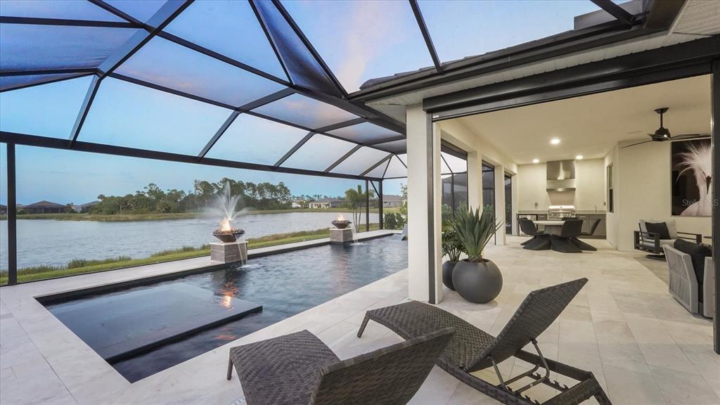 12866 Pinnacle Lane Venice, FL 34293 - Photo 51 of 96 a view of a floor to ceiling window and wooden floor