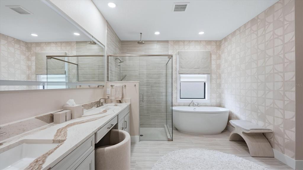 12866 Pinnacle Lane Venice, FL 34293 - Photo 54 of 96 a bathroom with a sink a toilet and bathtub