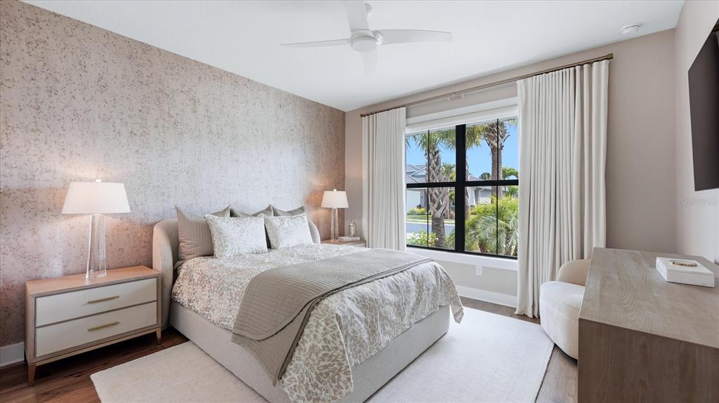 12866 Pinnacle Lane Venice, FL 34293 - Photo 60 of 96 a bedroom with a bed and a window