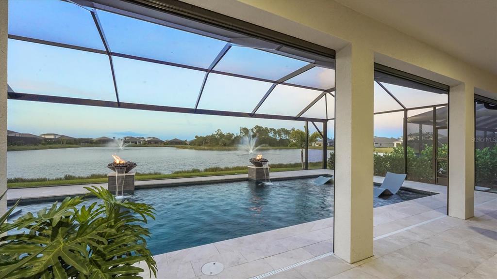 12866 Pinnacle Lane Venice, FL 34293 - Photo 6 of 96 a view of a lake with a ocean view