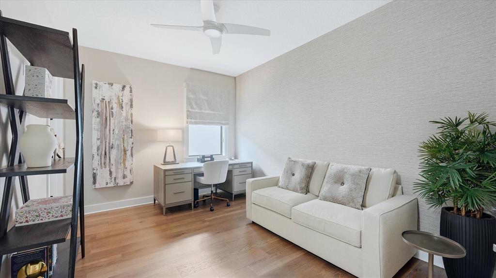 12866 Pinnacle Lane Venice, FL 34293 - Photo 66 of 96 a living room with furniture and a large window