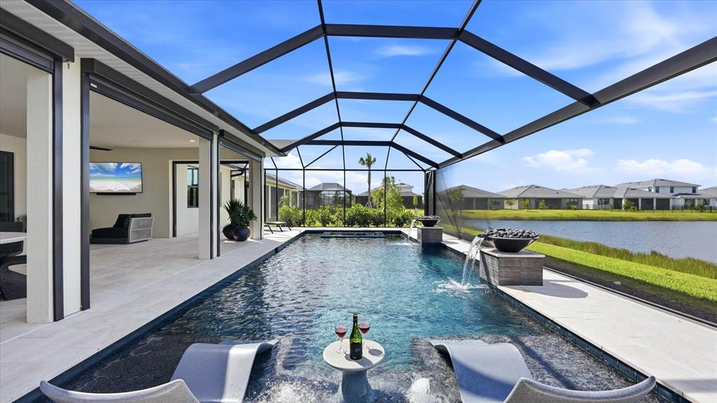 12866 Pinnacle Lane Venice, FL 34293 - Photo 67 of 96 a view of swimming pool with seating space