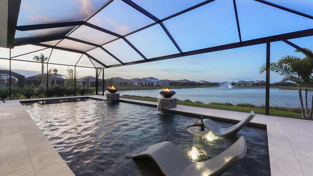 12866 Pinnacle Lane Venice, FL 34293 - Photo 7 of 96 a view of a balcony with lake view and mountain view