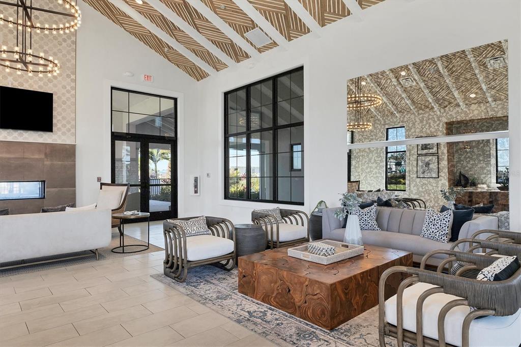 12866 Pinnacle Lane Venice, FL 34293 - Photo 85 of 96 a living room with furniture and a large window