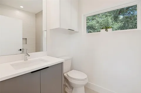 a bathroom with a sink and a toilet