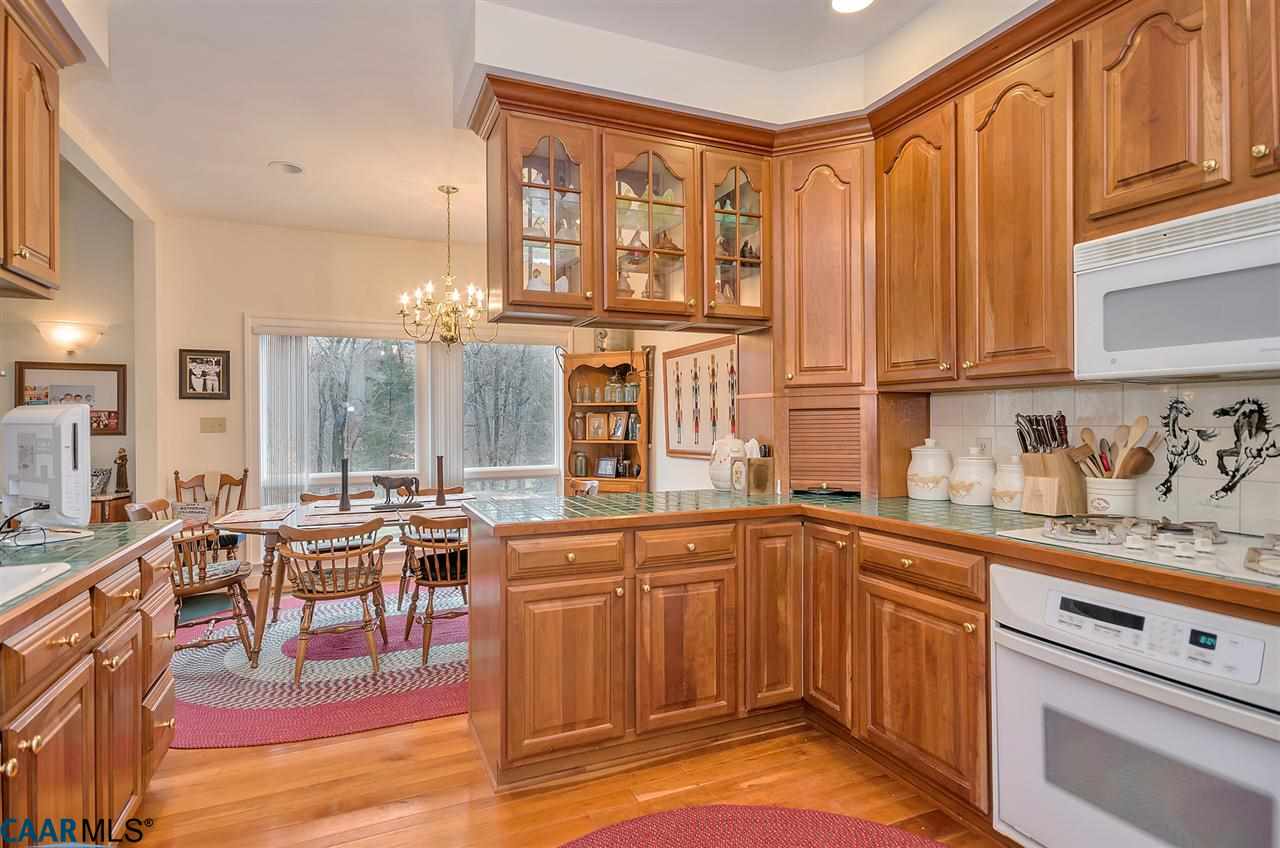 3895 Jacks Shop Road Rochelle, VA 22738 - Photo 11 of 41 a kitchen with lots of counter top space and dining table