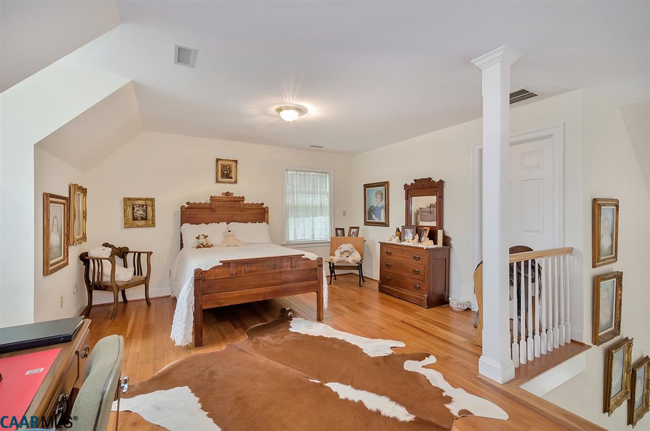 3895 Jacks Shop Road Rochelle, VA 22738 - Photo 17 of 41 a bedroom with furniture and a wooden floor