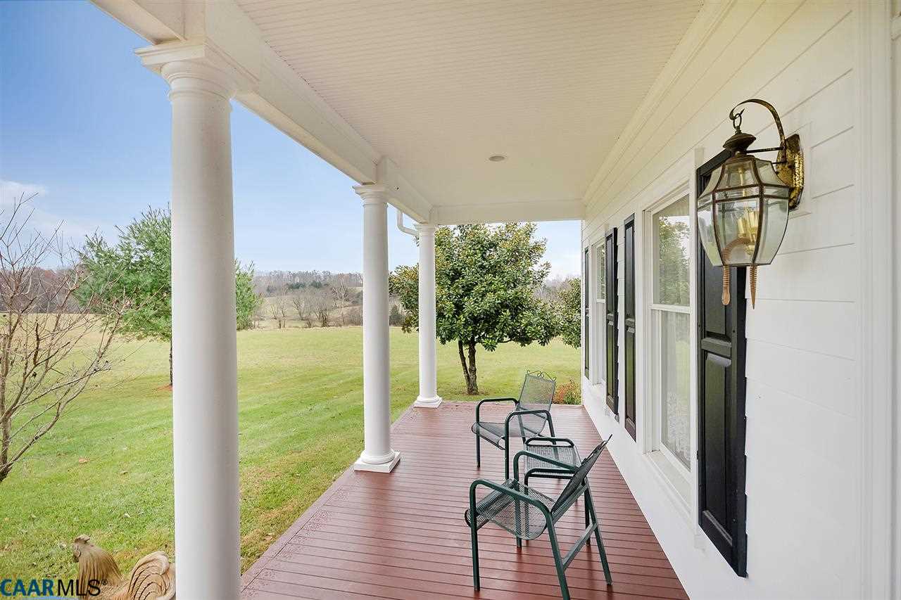 3895 Jacks Shop Road Rochelle, VA 22738 - Photo 6 of 41 a view of a balcony with furniture and wooden floor