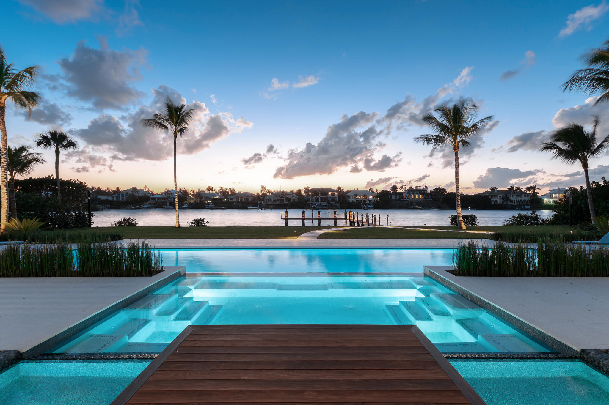 488 South Beach Road Jupiter Island, FL 33455 - Photo 53 of 54 a view of a swimming pool with a lake view