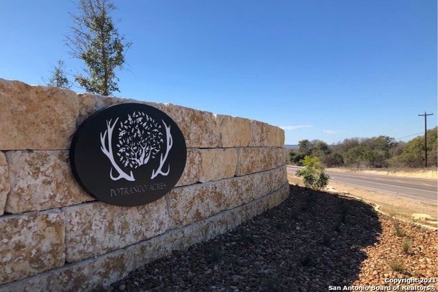 282 Bauer Lane Castroville, TX 78009 - Photo 1 of 1 a view of a bench in a backyard