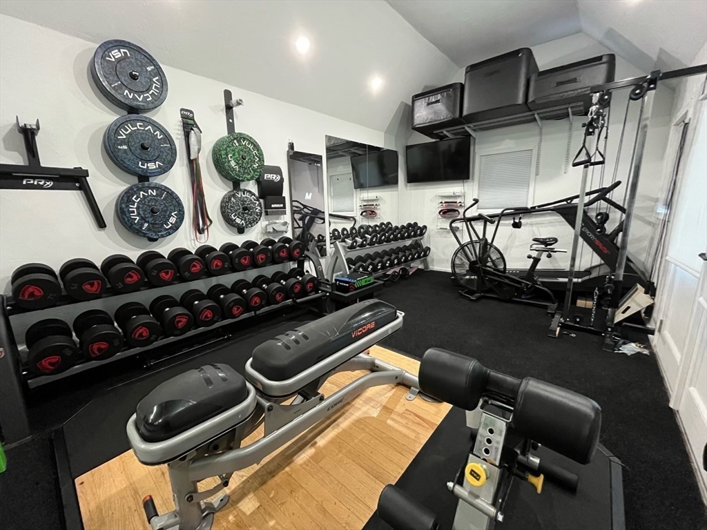 37 Tyson Road Worcester, MA 01606 - Photo 14 of 18 a room with gym equipment and wooden floor