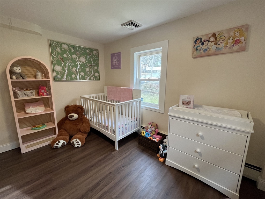37 Tyson Road Worcester, MA 01606 - Photo 7 of 18 a bedroom with a bed and a window