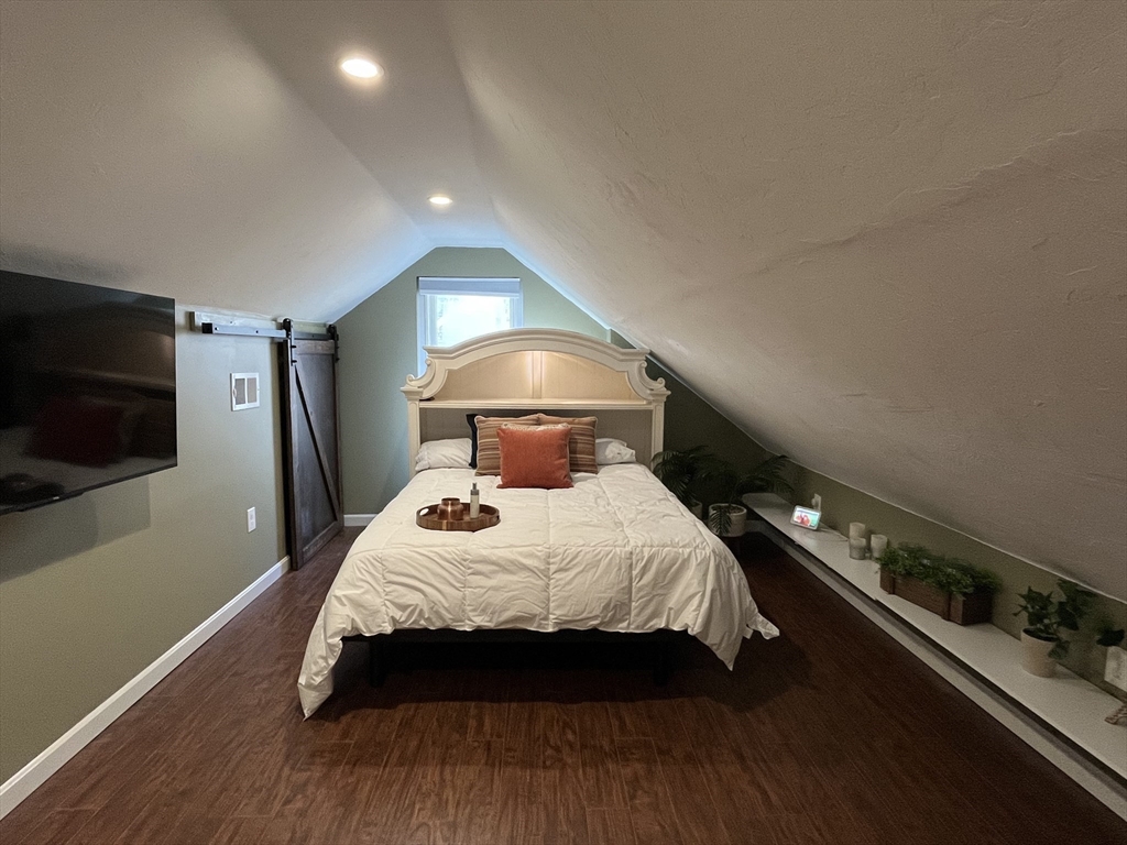 37 Tyson Road Worcester, MA 01606 - Photo 8 of 18 a bedroom with a bed and a television