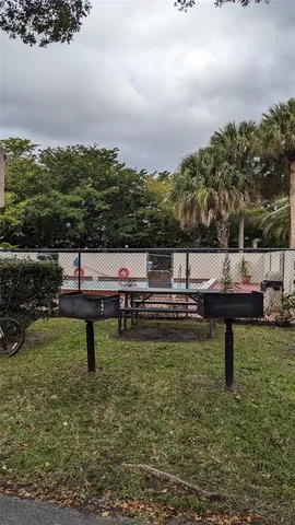 a view of a lake with outdoor sitting area