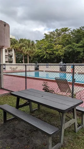 a view of a terrace with sitting area