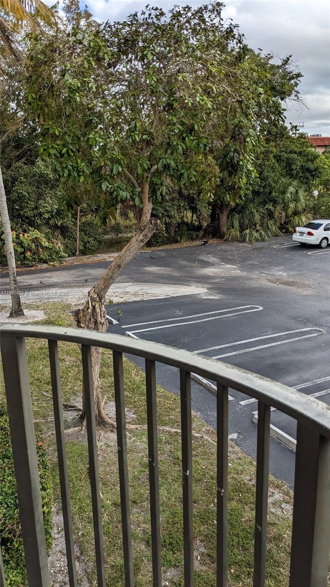 2701 Riverside Drive, Unit 206B Coral Springs, FL 33065 - Photo 9 of 19 a view of a balcony with an outdoor space