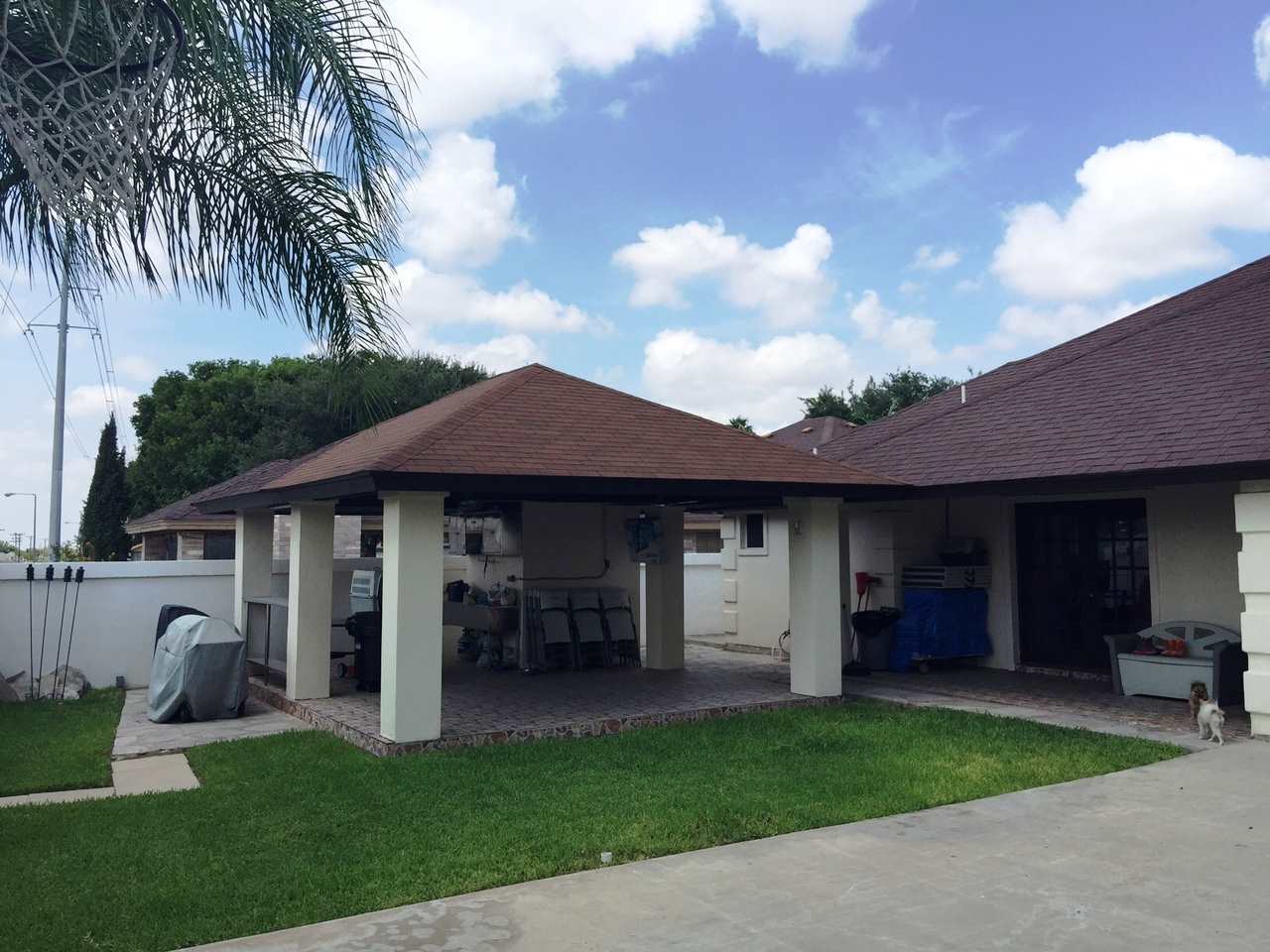415 Cayman Court Laredo, TX 78045 - Photo 13 of 18 a view of a chair and table in backyard
