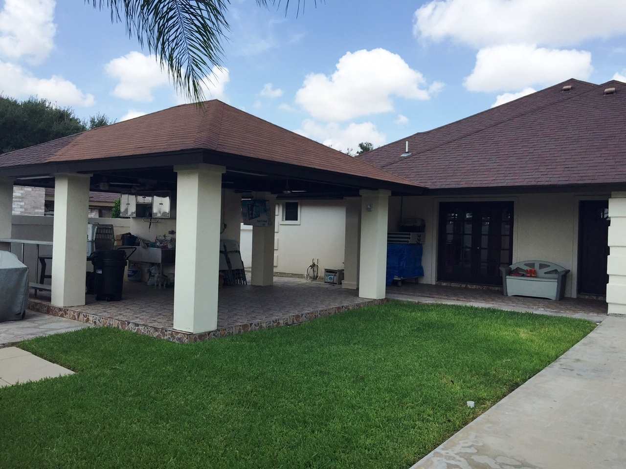415 Cayman Court Laredo, TX 78045 - Photo 14 of 18 a front view of a house with a yard and porch
