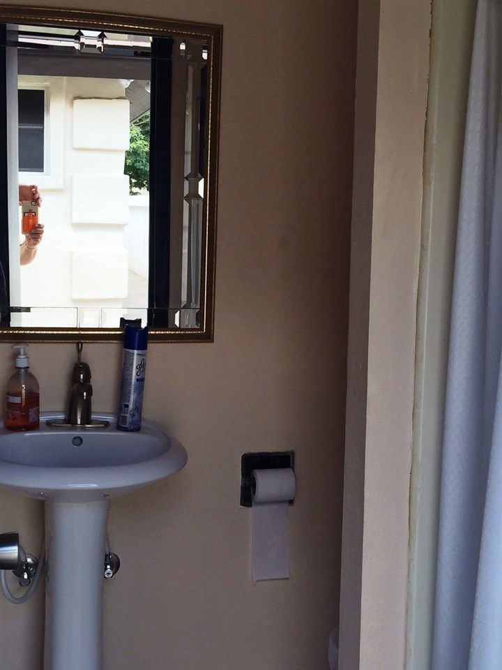 415 Cayman Court Laredo, TX 78045 - Photo 16 of 18 a bathroom with a sink and a mirror
