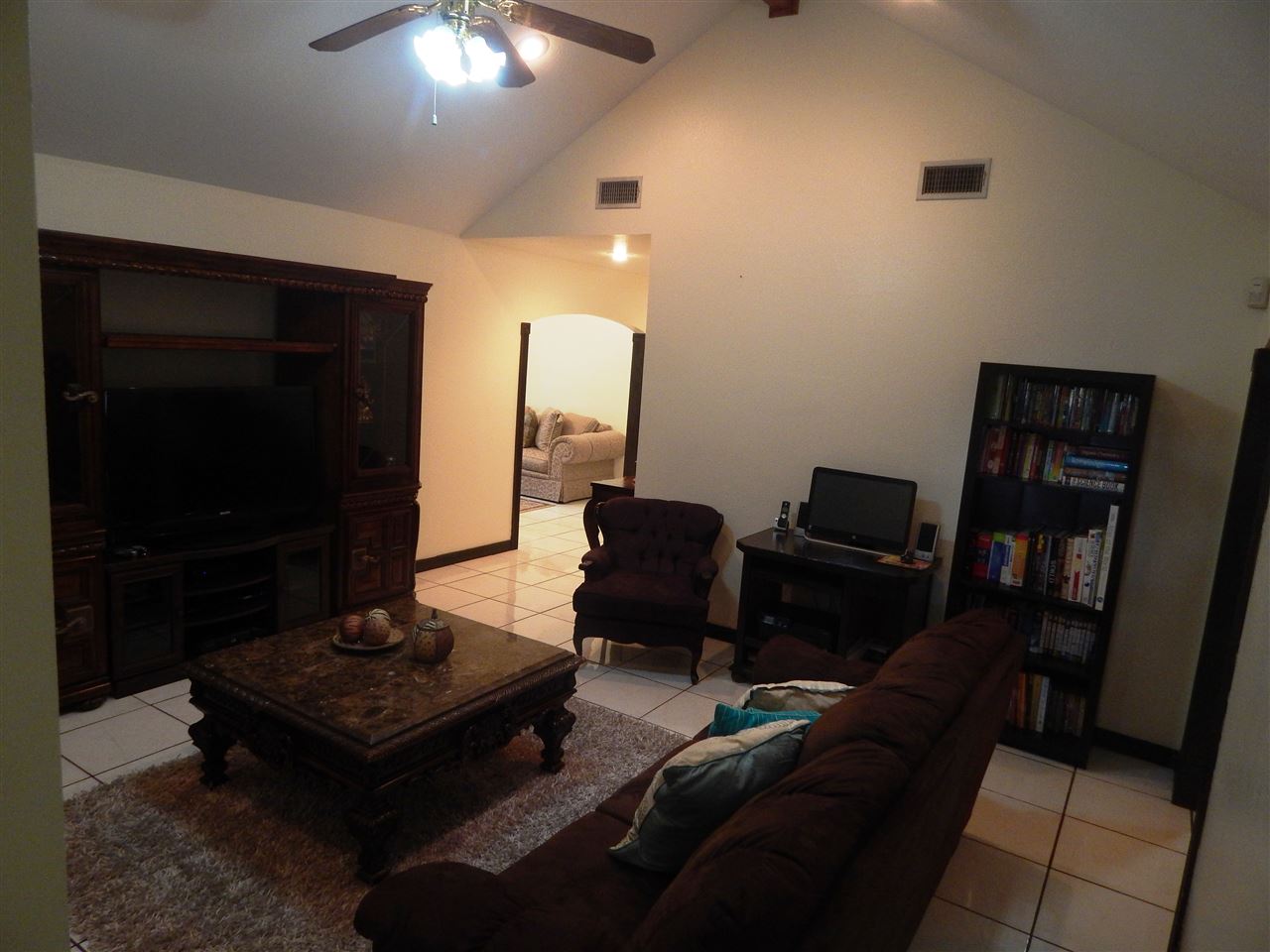 415 Cayman Court Laredo, TX 78045 - Photo 4 of 18 a living room with furniture and a flat screen tv