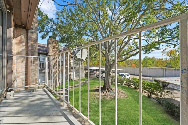 a view of a garage and car parked
