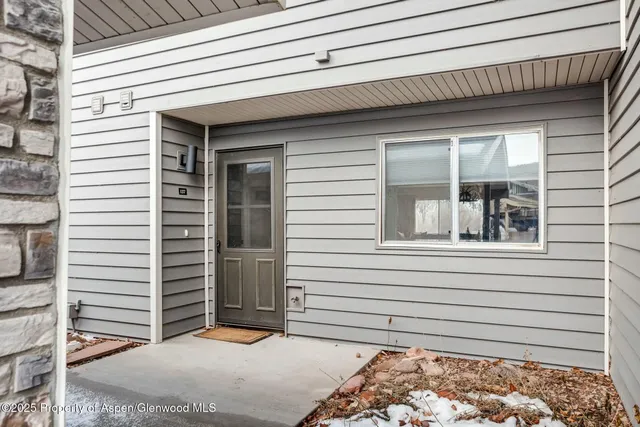 a front view of a house with a garage