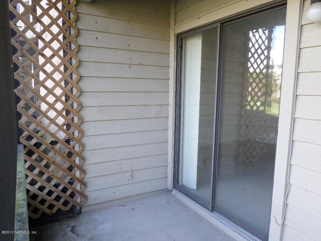 10200 Belle Rive Boulevard, Unit 69 Jacksonville, FL 32256 - Photo 15 of 17 a bathroom with a shower