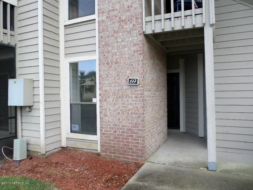 10200 Belle Rive Boulevard, Unit 69 Jacksonville, FL 32256 - Photo 2 of 17 a view of front door of house
