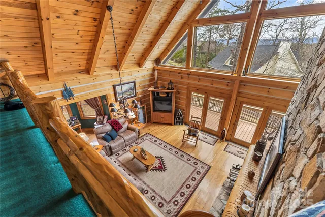 a bed room with a bed and a chair