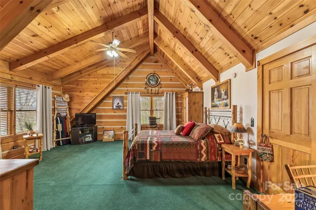 a bathroom with a sink a mirror and a shower